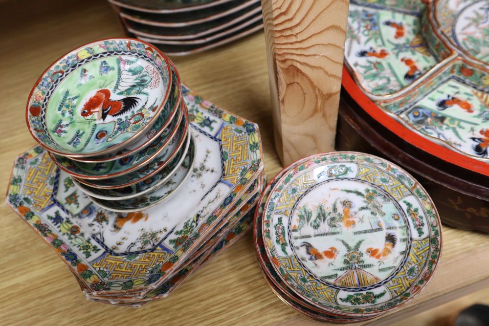 A collection of early 20th century Cantonese porcelain tea and dinnerwares, including an hors doeuvres set, in a lacquer box
